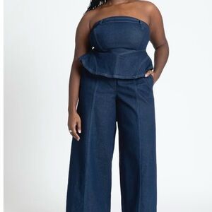 Curve-Friendly Strapless Dark Blue Denim Jumpsuit with Peplum Waist by Eloquii